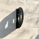Minimalist Black Restroom Directional Sign | Curved 3D Metal Bathroom Plaque
